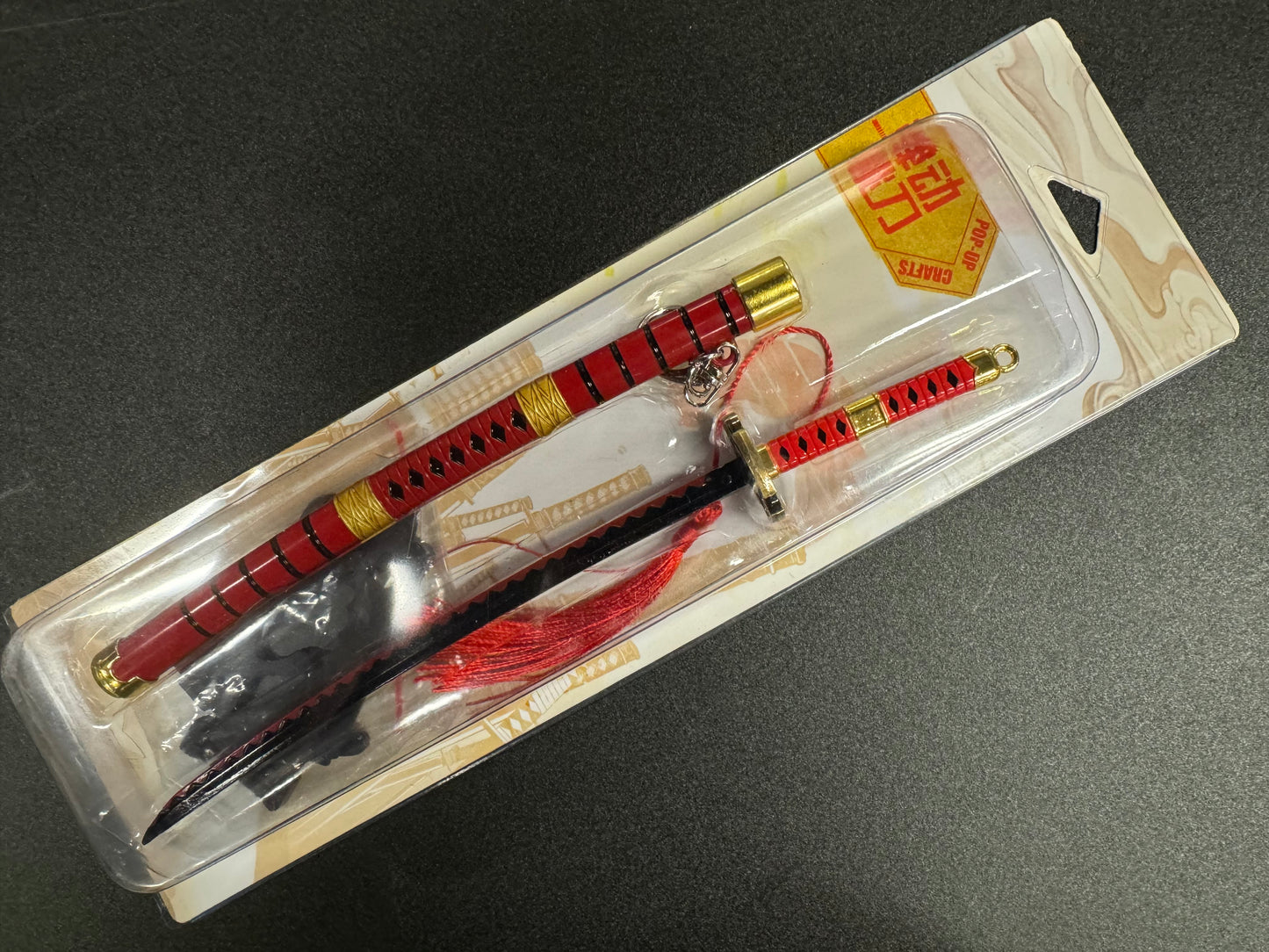 One Piece Zoro's Sandai Kitetsu Keychain