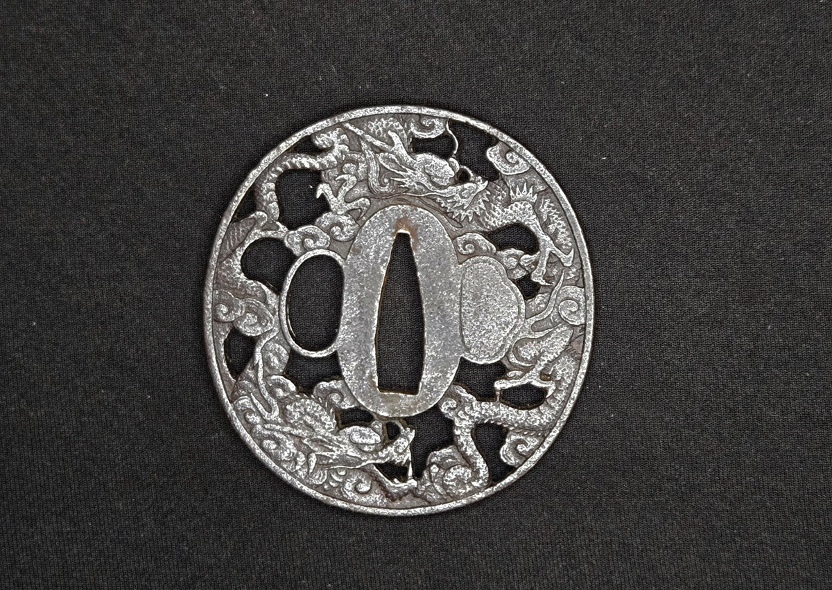 Antique Tsuba - cast iron cloud dragon