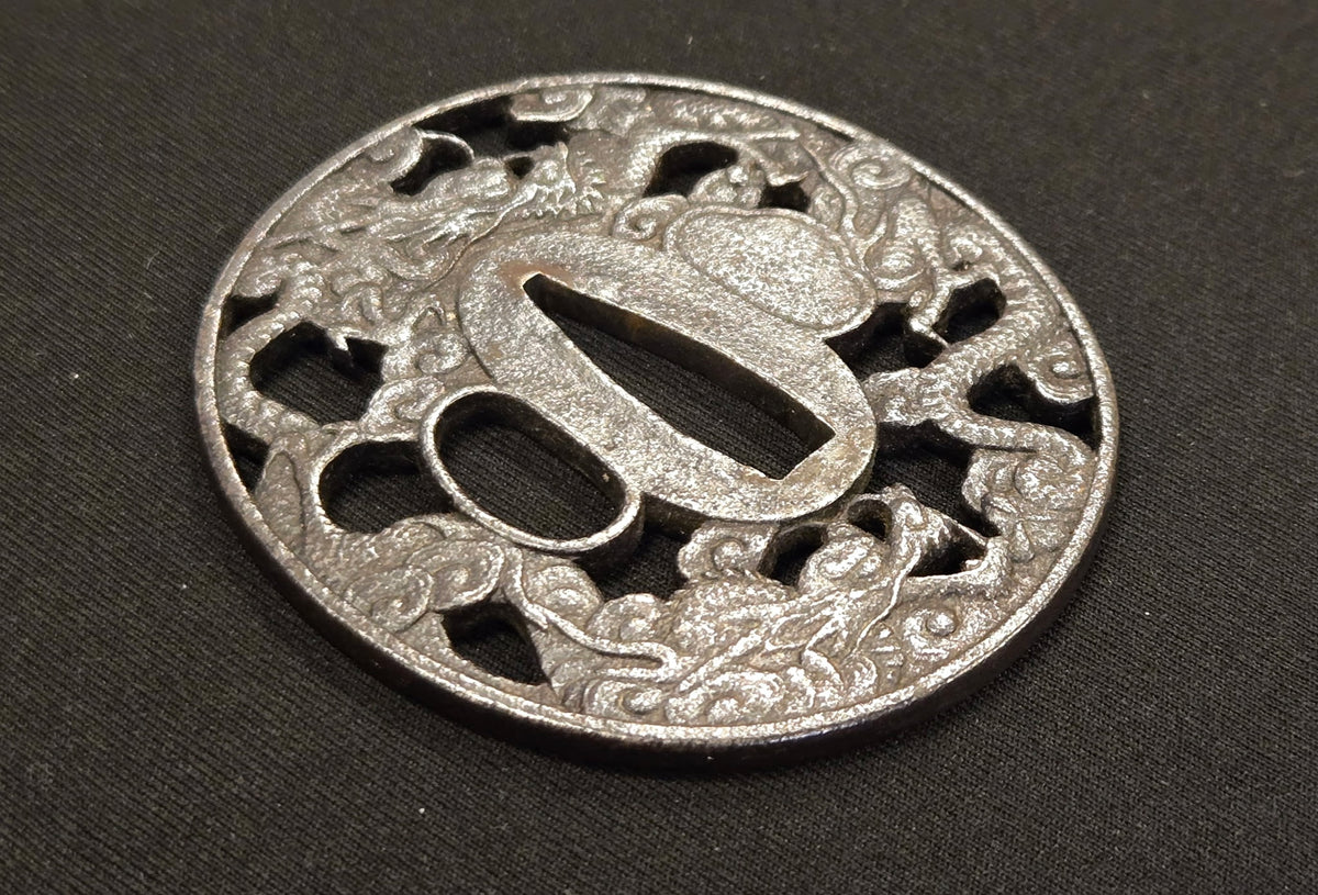Antique Tsuba - cast iron cloud dragon