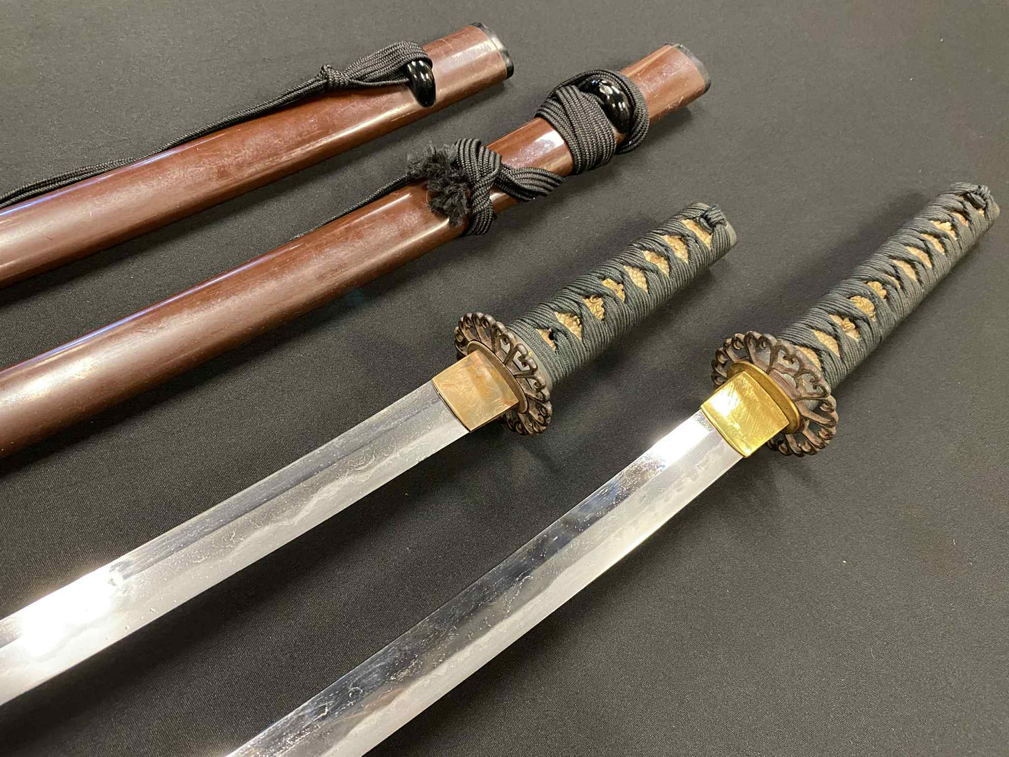 Antique Nihonto - Daishou Katana (Late Muromachi, red lacquer signature of Yoshikage) and Wakizashi (Late Muromachi, signed Kanefusa Masaie) (neither verified) with Koshirae