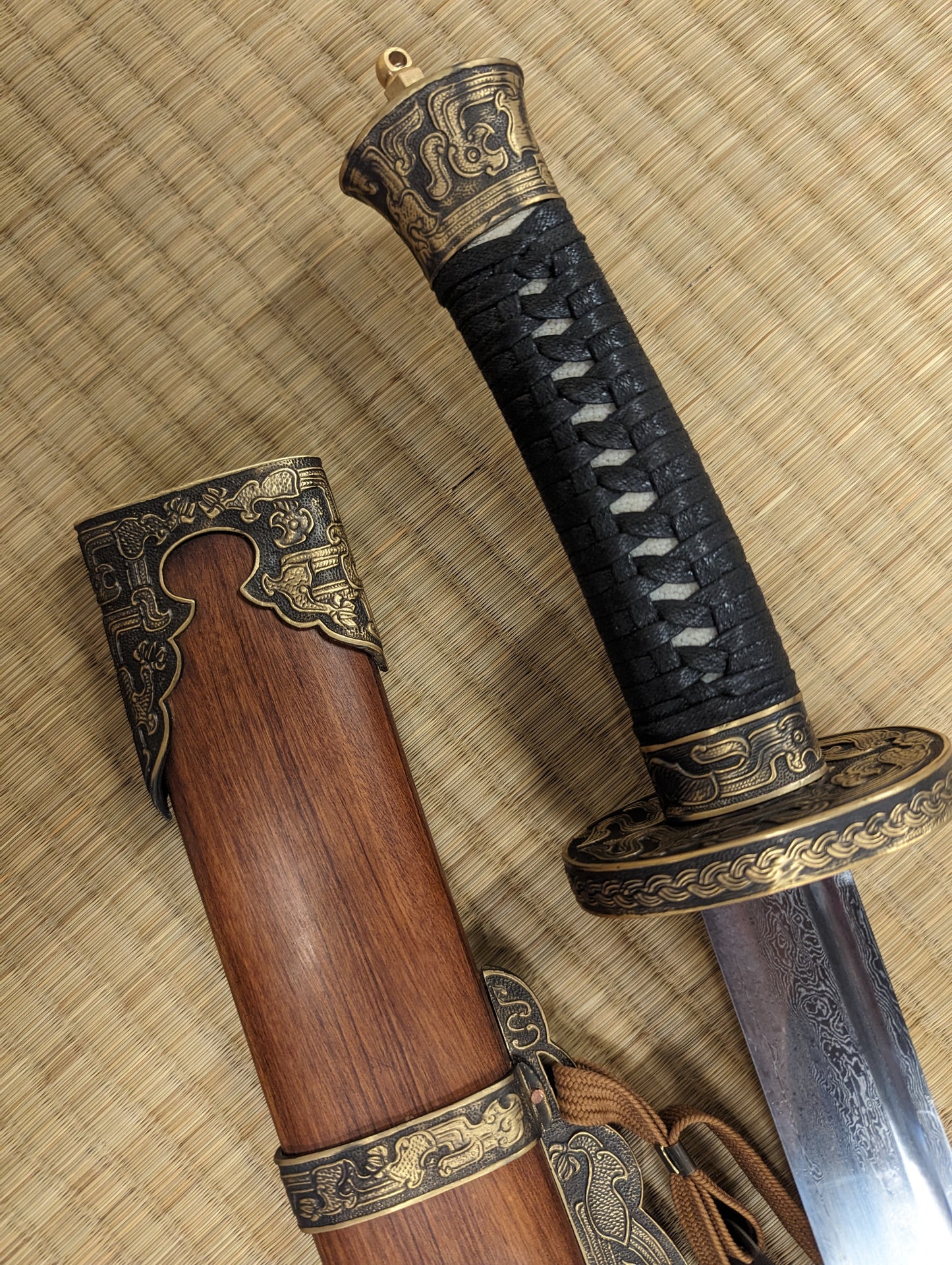 Oxtail Saber-  Damascus Steel